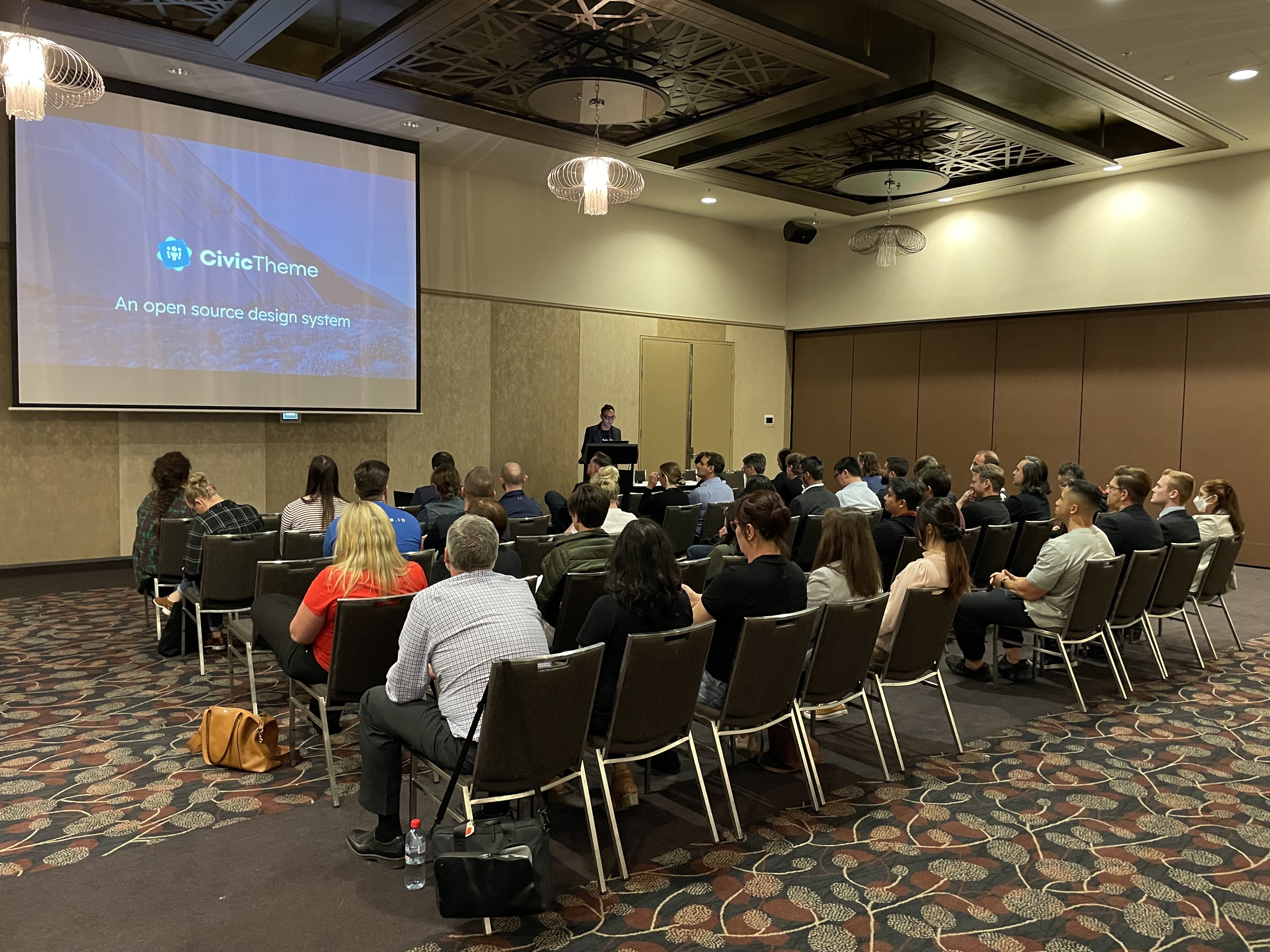 Photo of Akhil Bhandari (Salsa) presenting CivicTheme at the FUNctionality series
